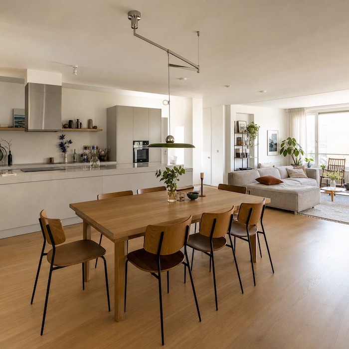 Open-plan dining area where pendant placement affects furniture layout.