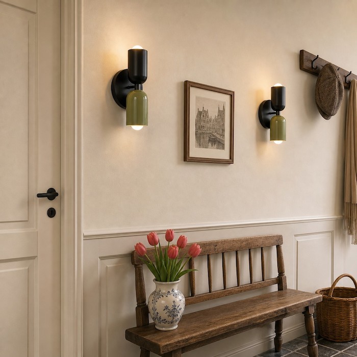 Wall sconce installed at a balanced height for layered wall light.