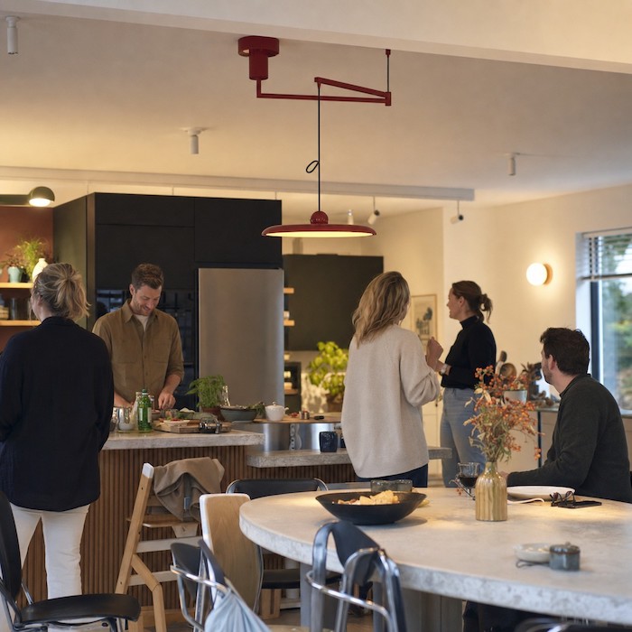 Flexible pendant lighting supporting a casual weekend gathering.