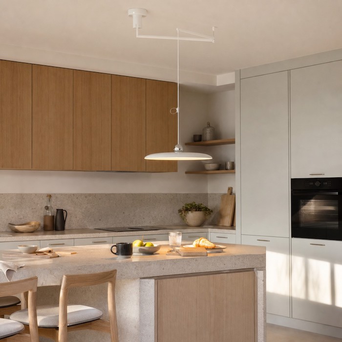 Adjustable pendant light supporting morning breakfast and kitchen prep.