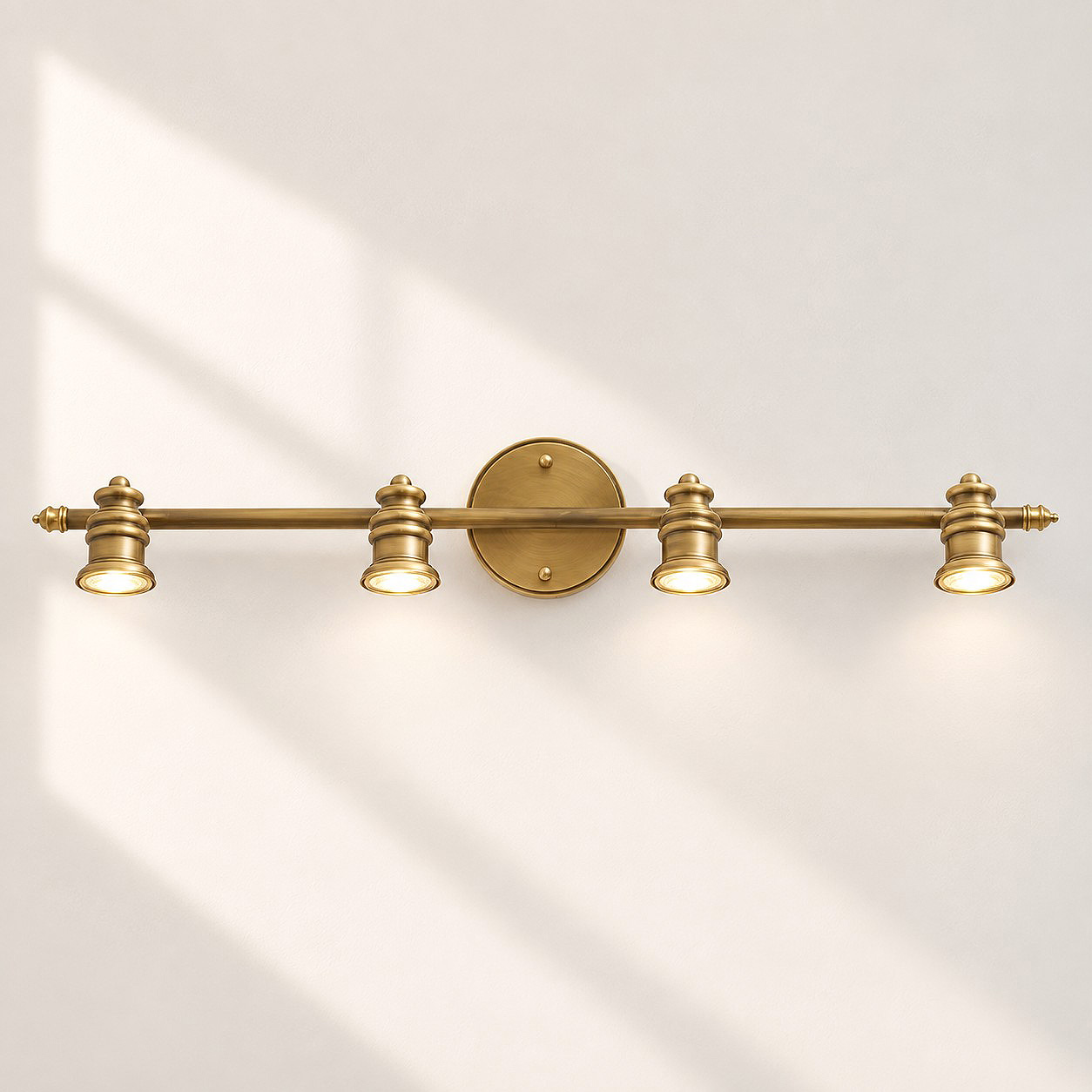 Aurelia Brass Vanity Wall Light with sculpted shades and a linear wall bar
