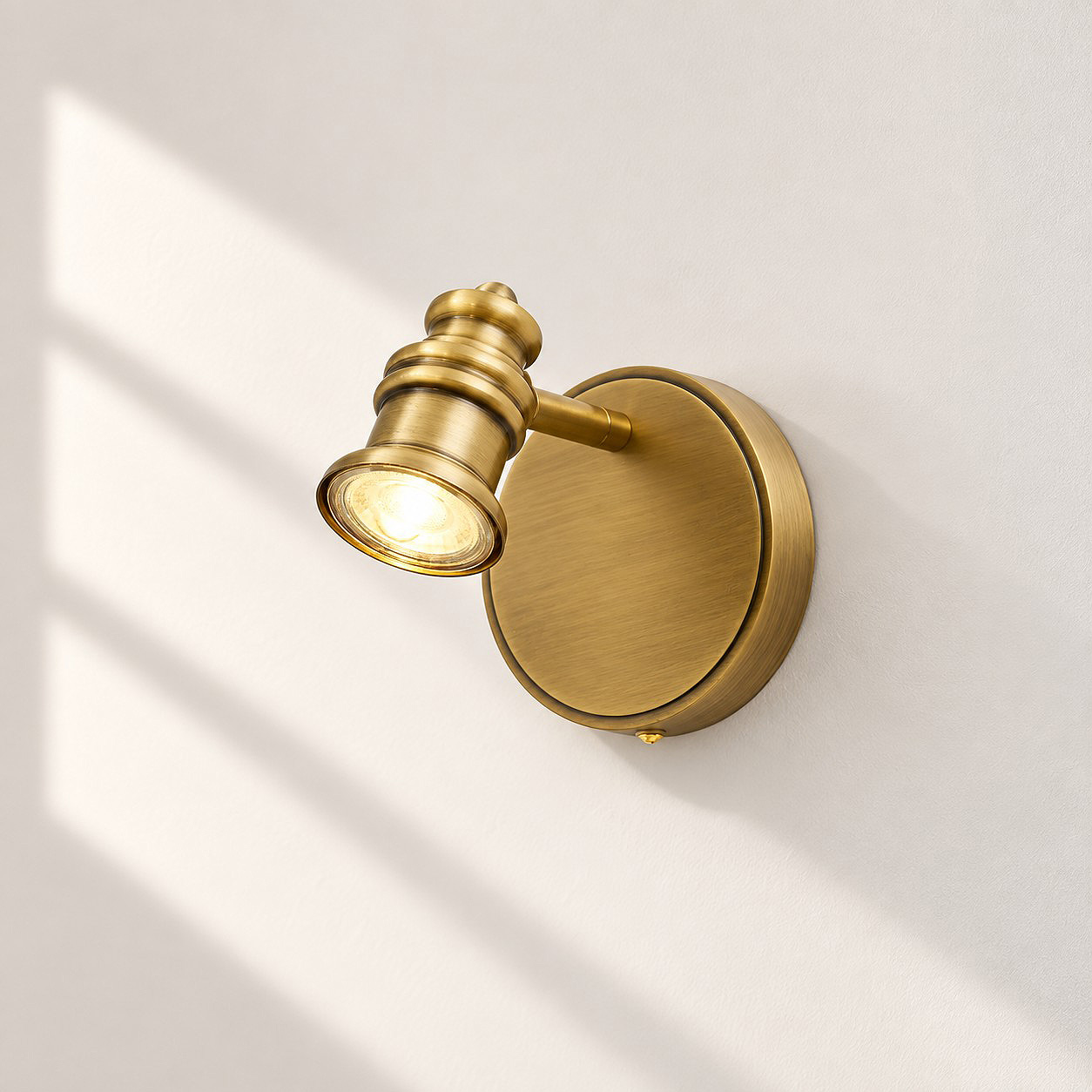 Aurelia Brass Vanity Wall Light with sculpted shades and a linear wall bar
