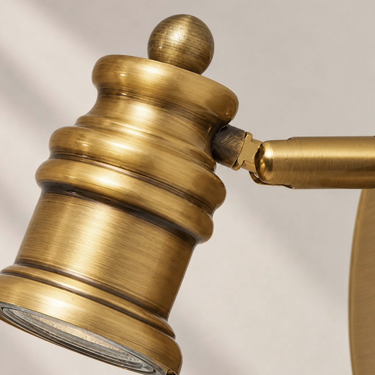 Aurelia Brass Vanity Wall Light with sculpted shades and a linear wall bar