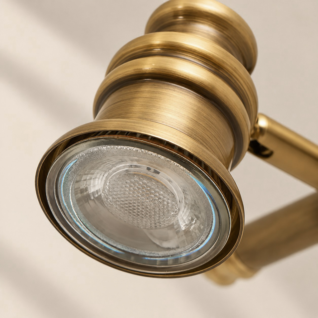 Aurelia Brass Vanity Wall Light with sculpted shades and a linear wall bar