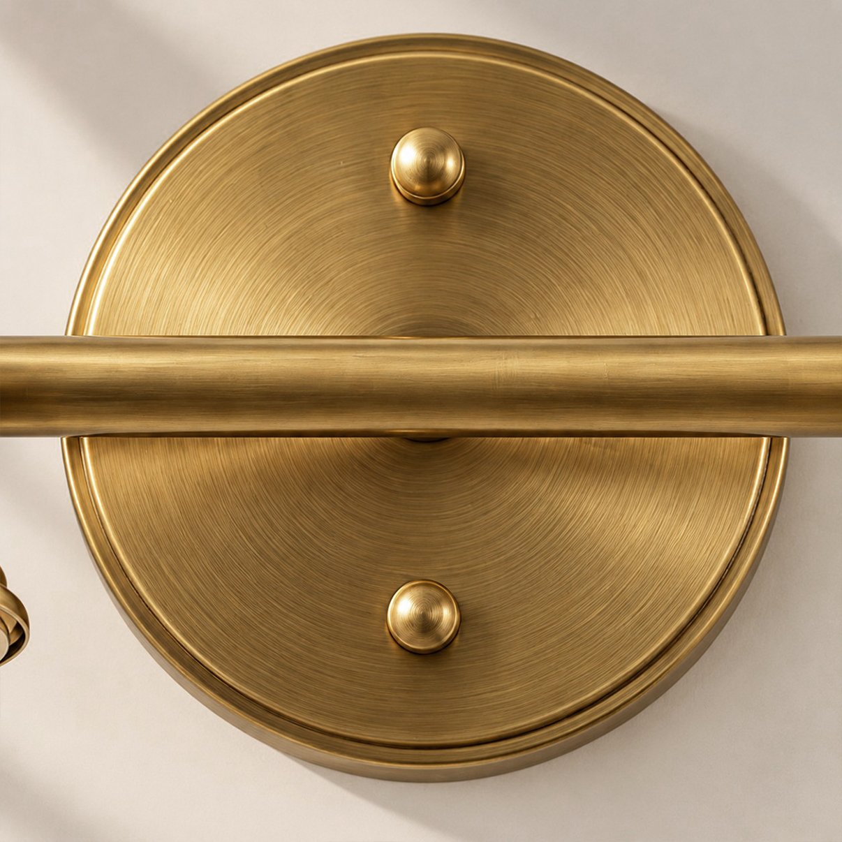 Aurelia Brass Vanity Wall Light with sculpted shades and a linear wall bar