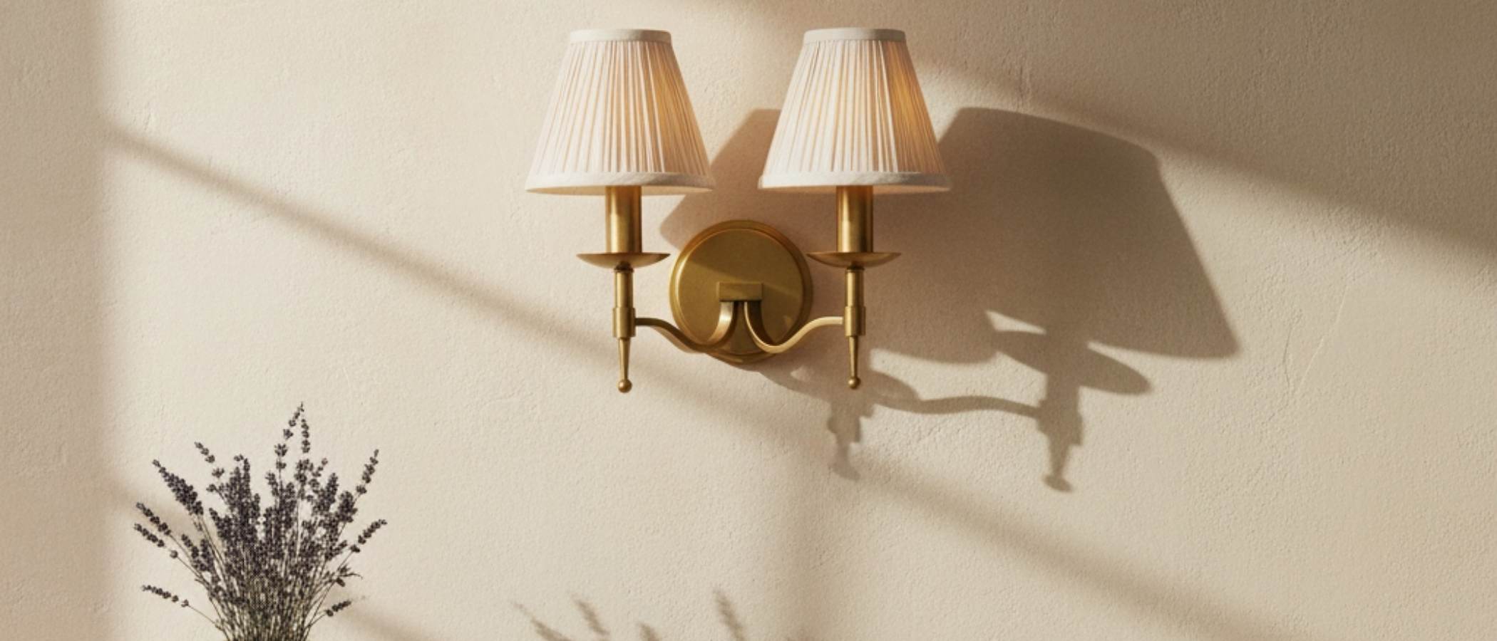 Tela Traditional Brass Wall Light in a softly lit room