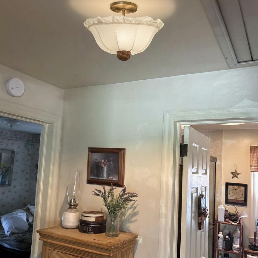 Klantfoto met Wickara plafondlamp in gang