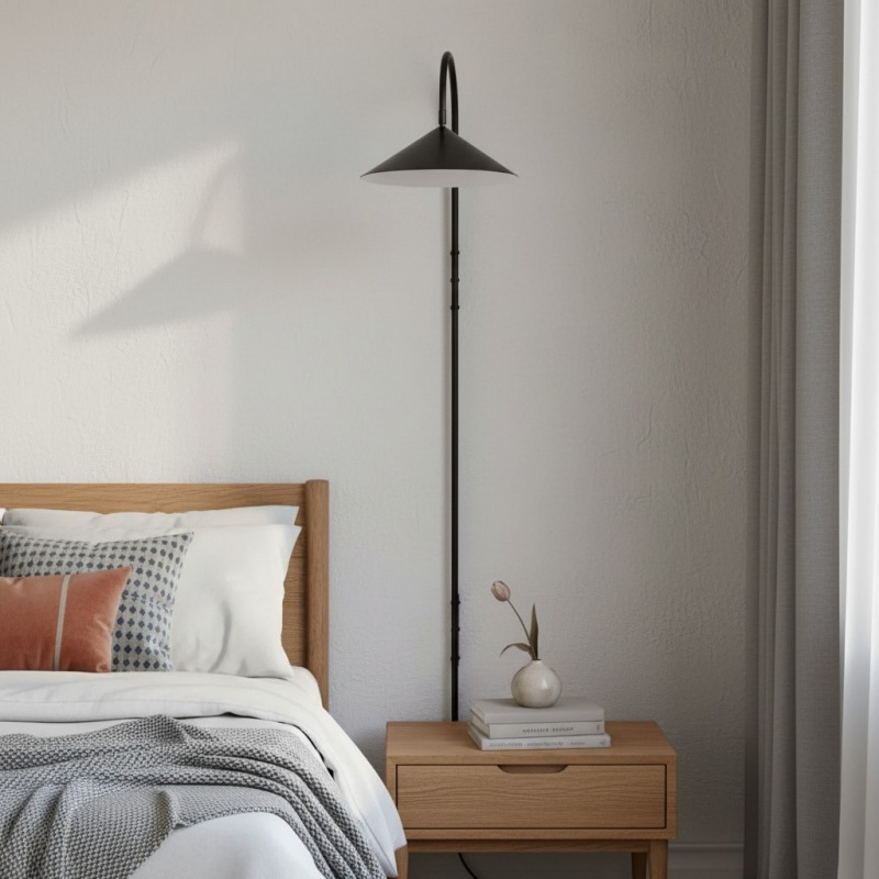 Nulavo wandlamp naast bed