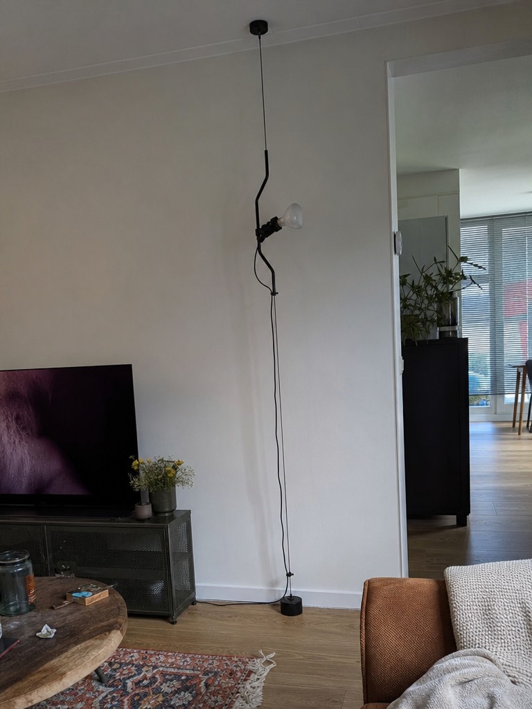 Parentesi lamp bij open haard