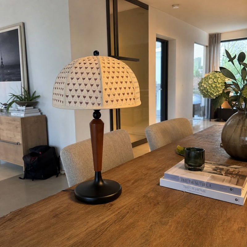 Klantfoto van Fennary tafellamp op tafel