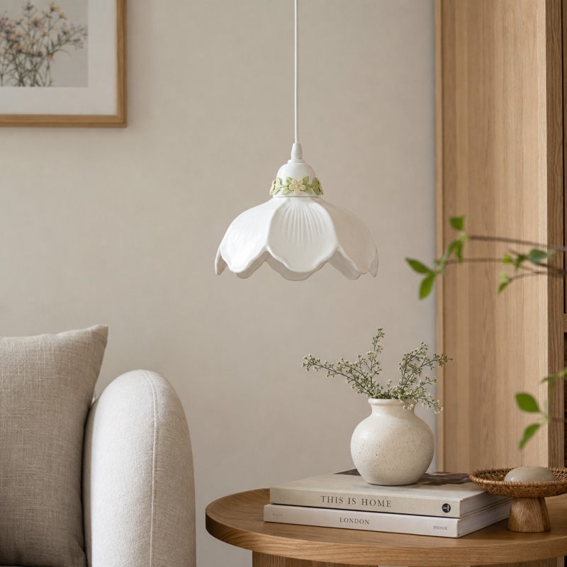 White Cazelle flower pendant lamp near a sofa