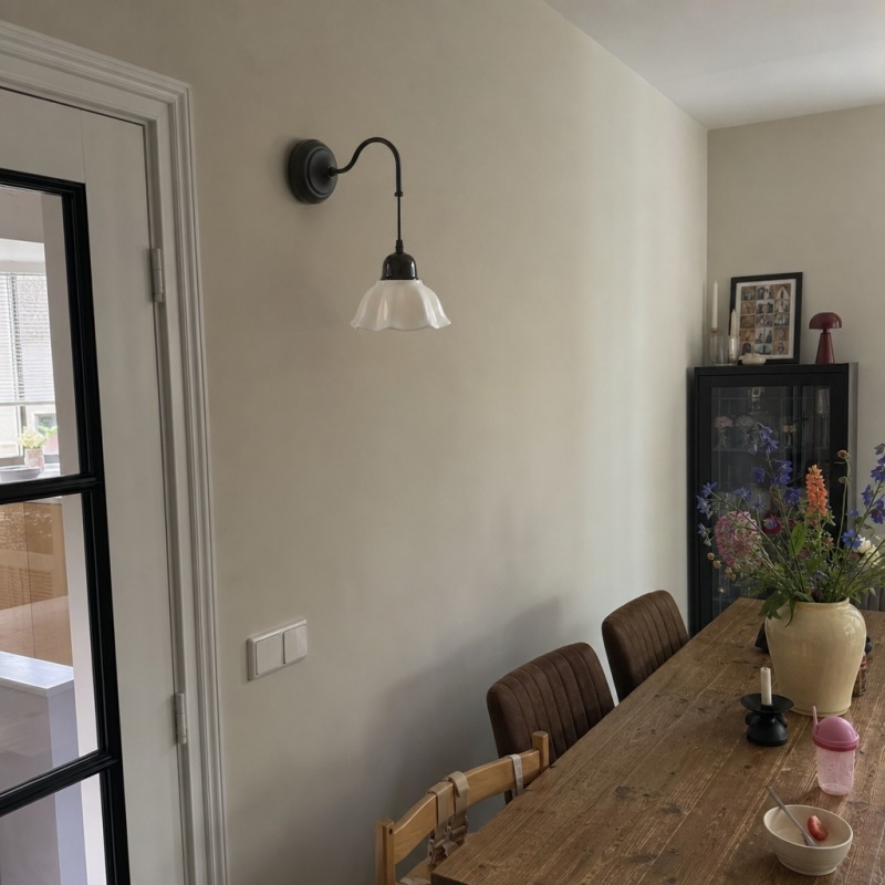 Klantfoto van de Cazelle wandlamp aan de muur