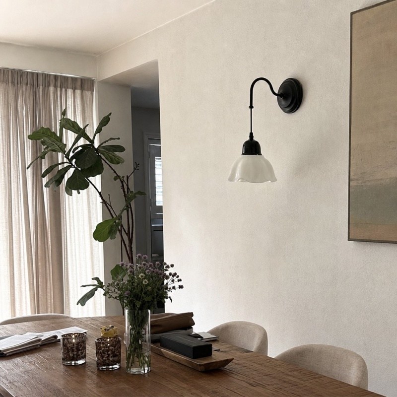 Klantfoto van de Cazelle wandlamp in eetruimte