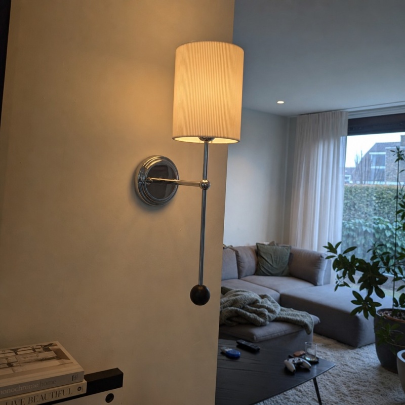 Klantfoto van Cumoris wandlamp met warm licht