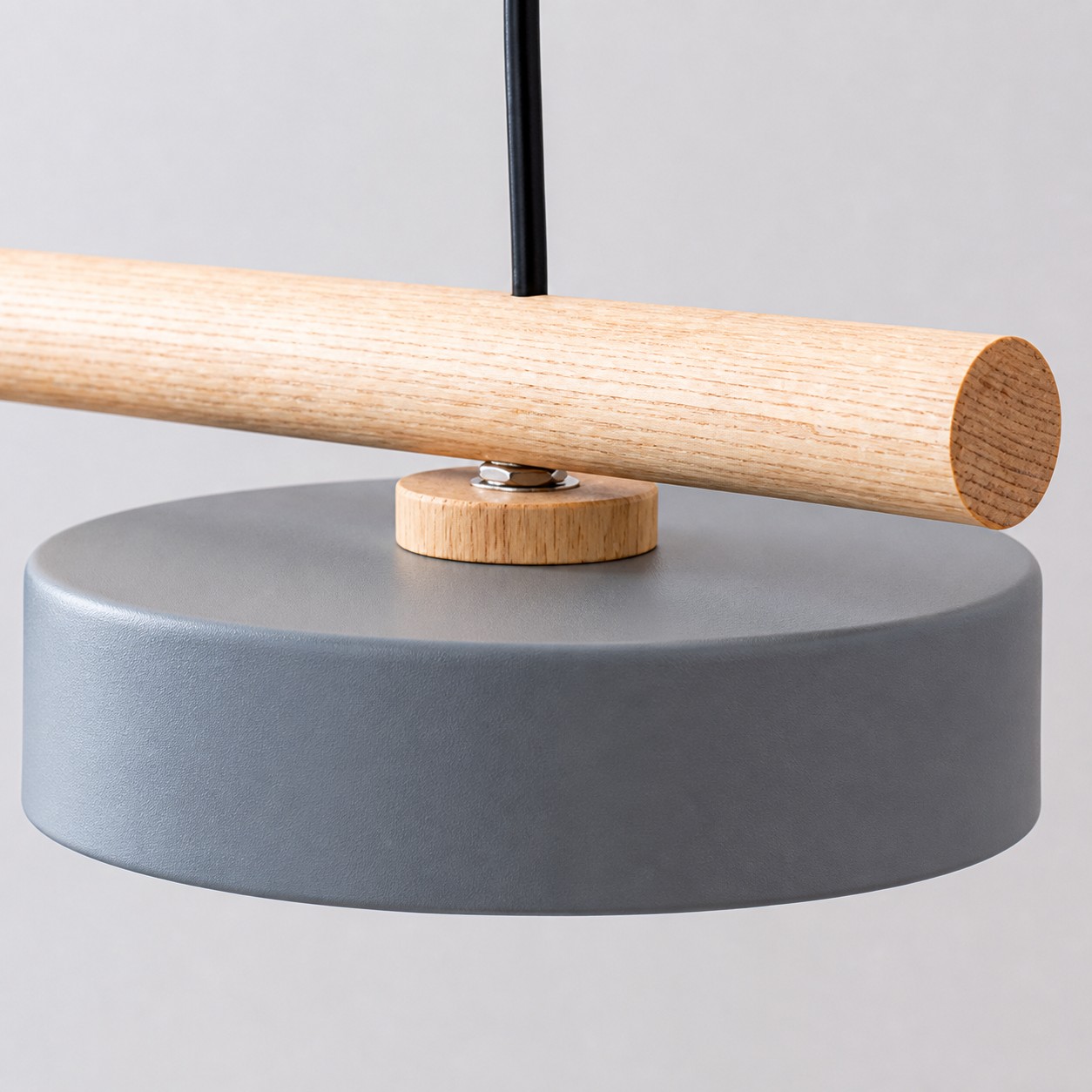 Wooden bar and metal shade connection detail