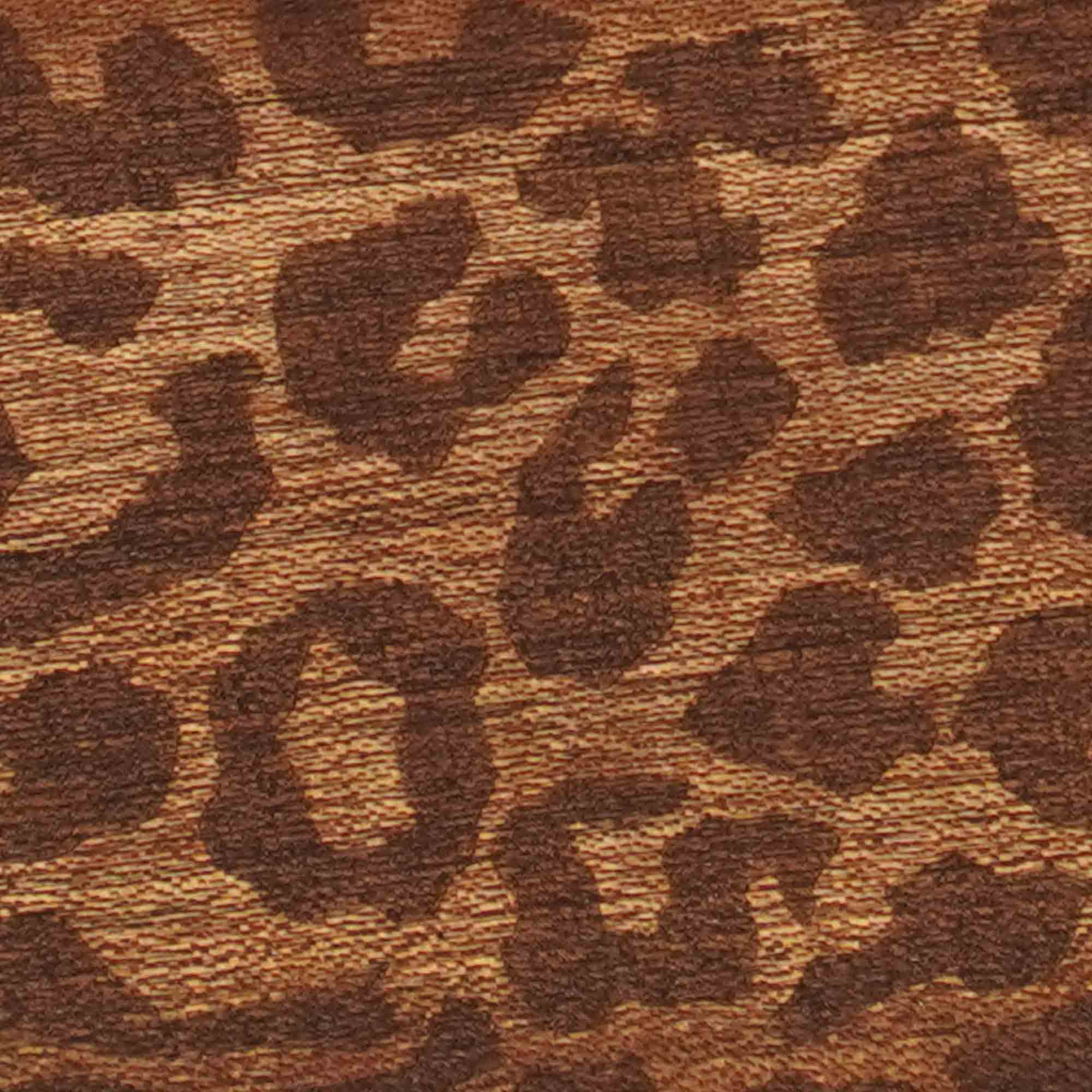 Detail van de geëtste luipaardprint in het hout