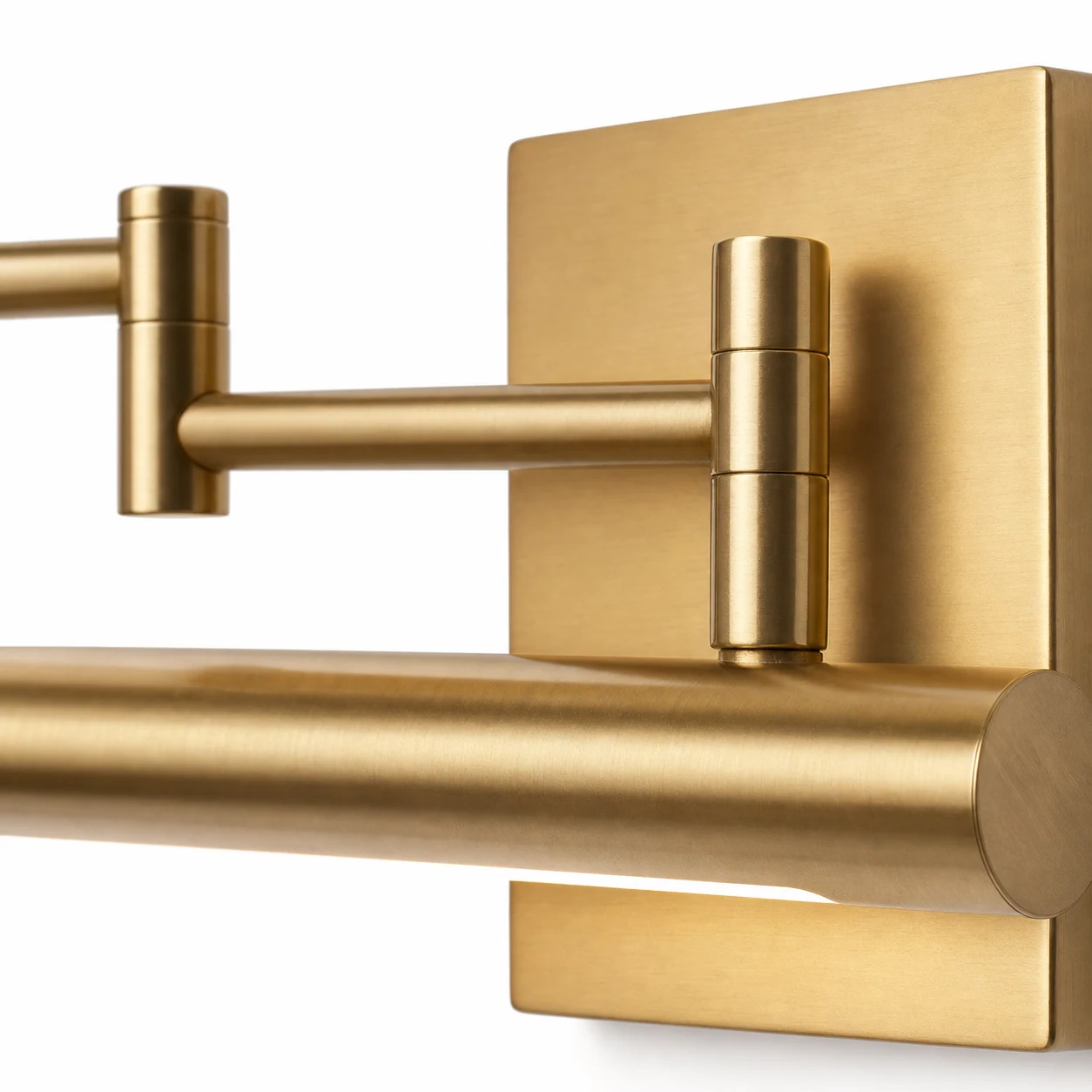 Close detail of the Edge gold wall lamp finish and acrylic shade