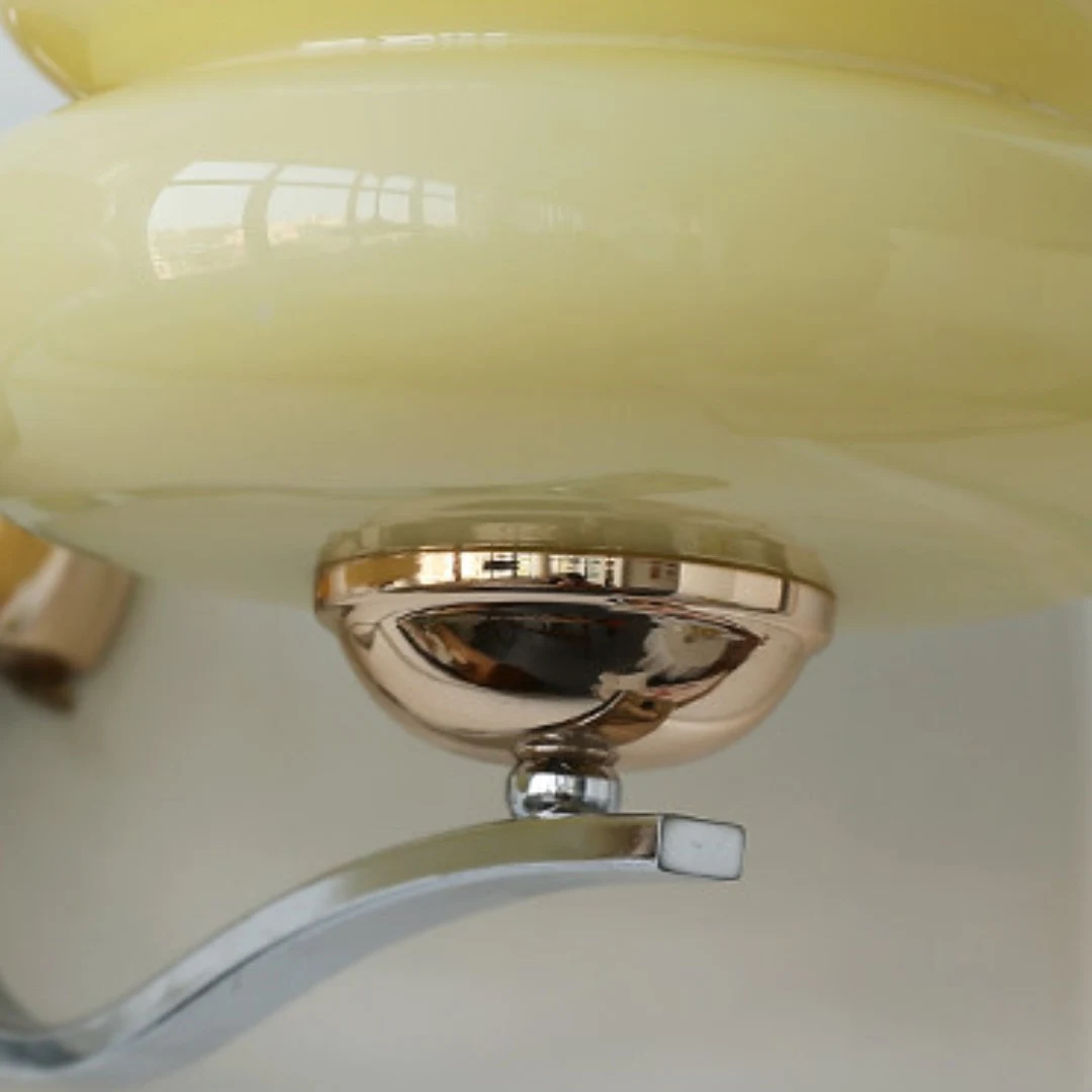 Polished metal connection and curved arm