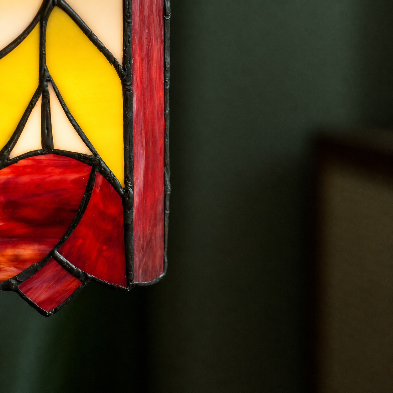 Ruby and yellow colored glass close detail