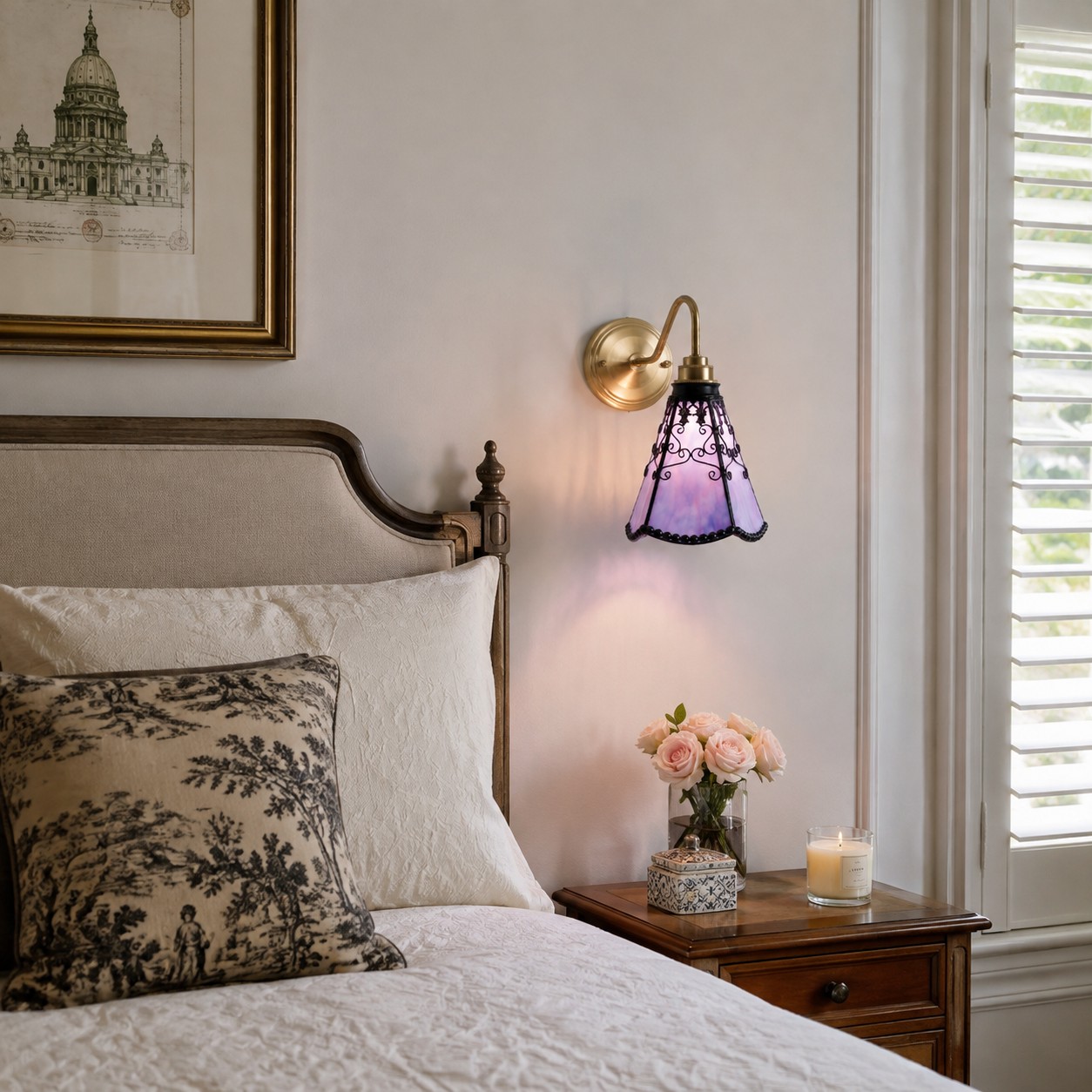 Gradient purple wall sconce beside a bed