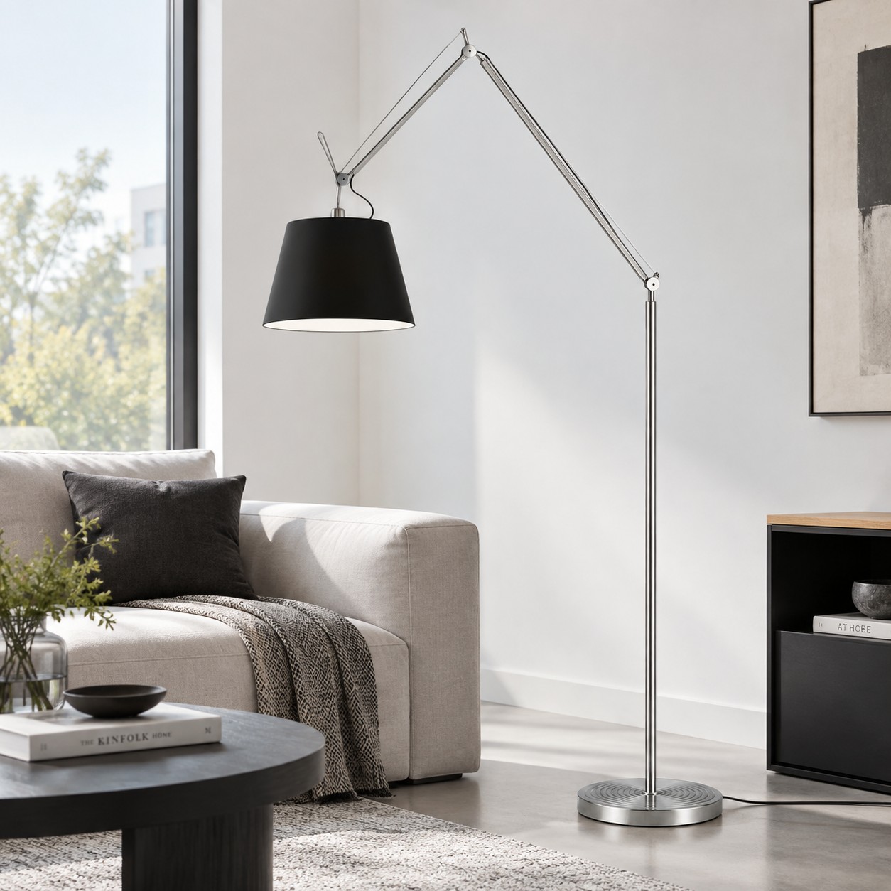 White shade floor lamp by a desk