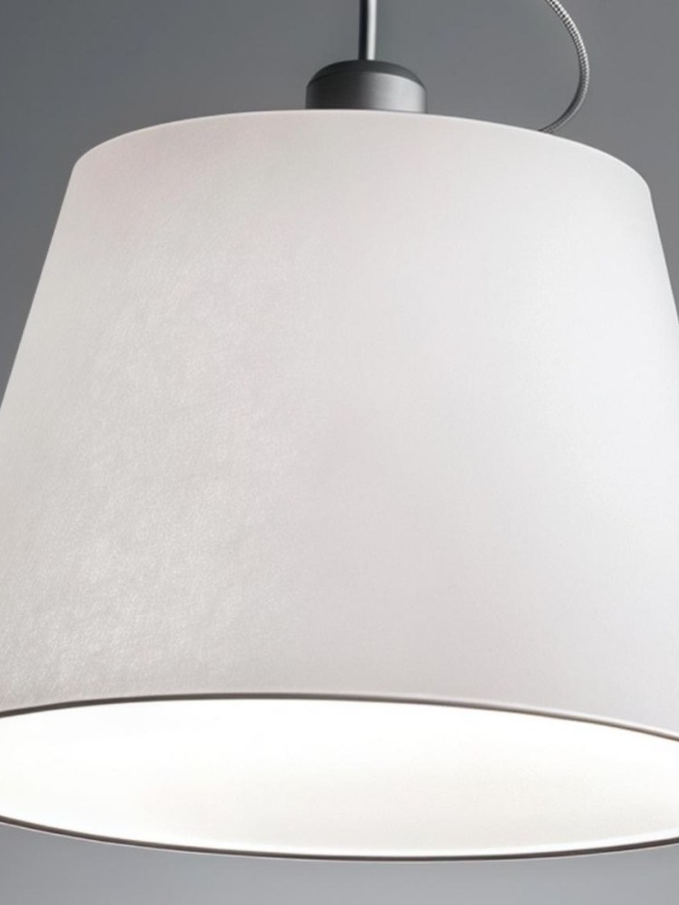 Close-up of the white fabric shade and illuminated diffuser