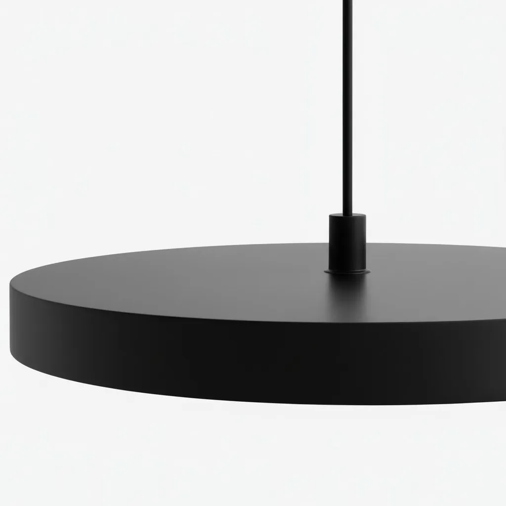 Detailopname van de ophangkabel bij de steel van de schijf