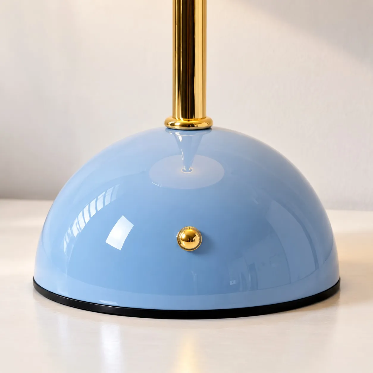 Veloura blue glass base and polished stem detail